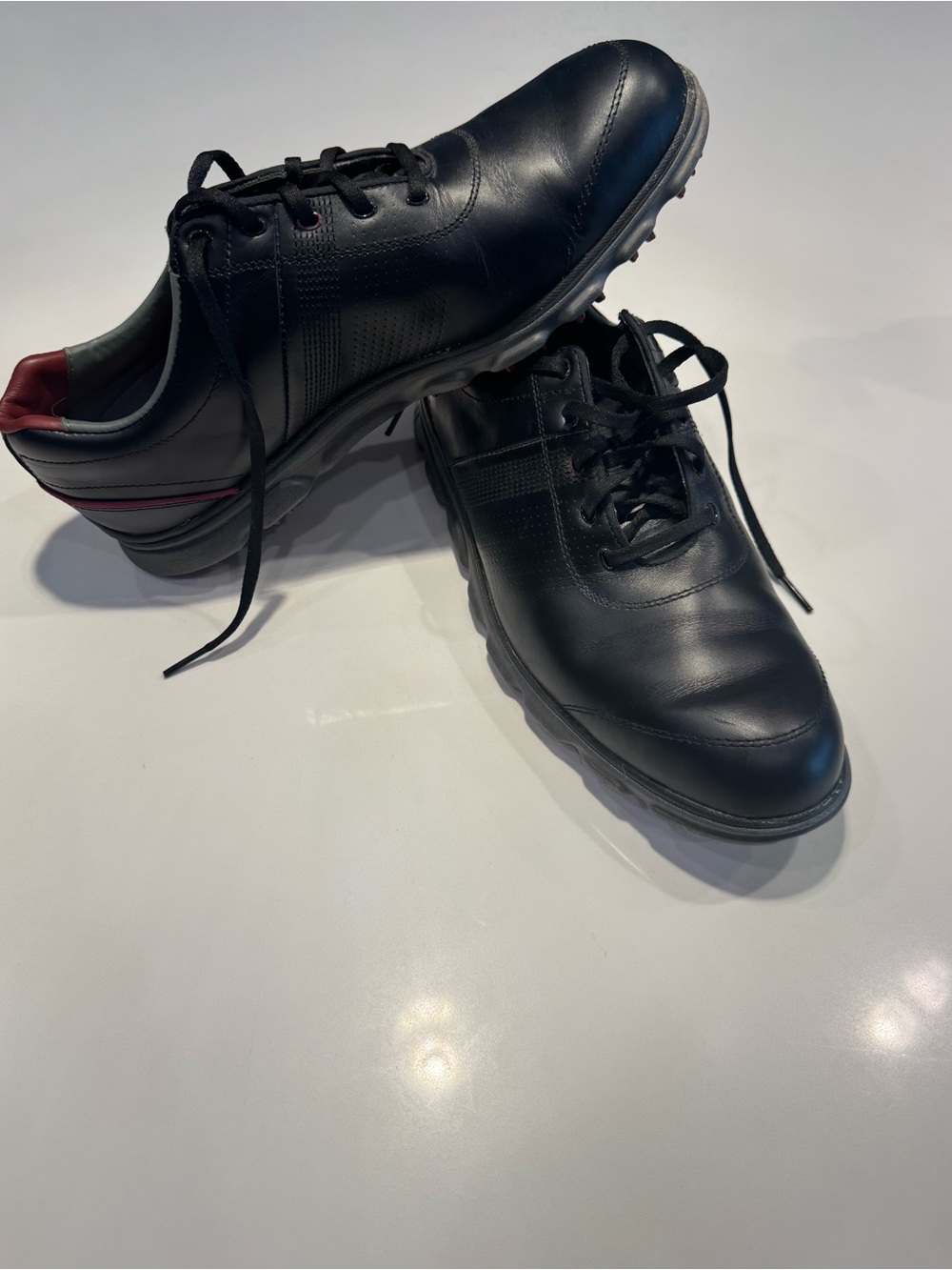 Men's Black Leather Lace-Up Comfort Sneakers with Red Heel Accent